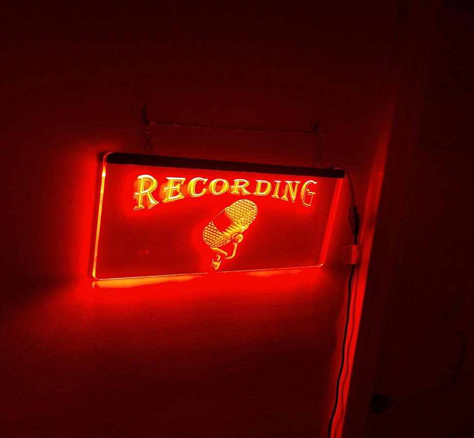 My family gifted me this sign for my birthday. It helps ensure we're not disturbed while recording. Very Helpful